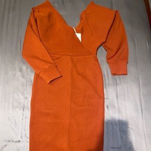 Bella Barnett orange body fitting dress